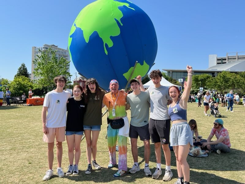 attendees with big earth